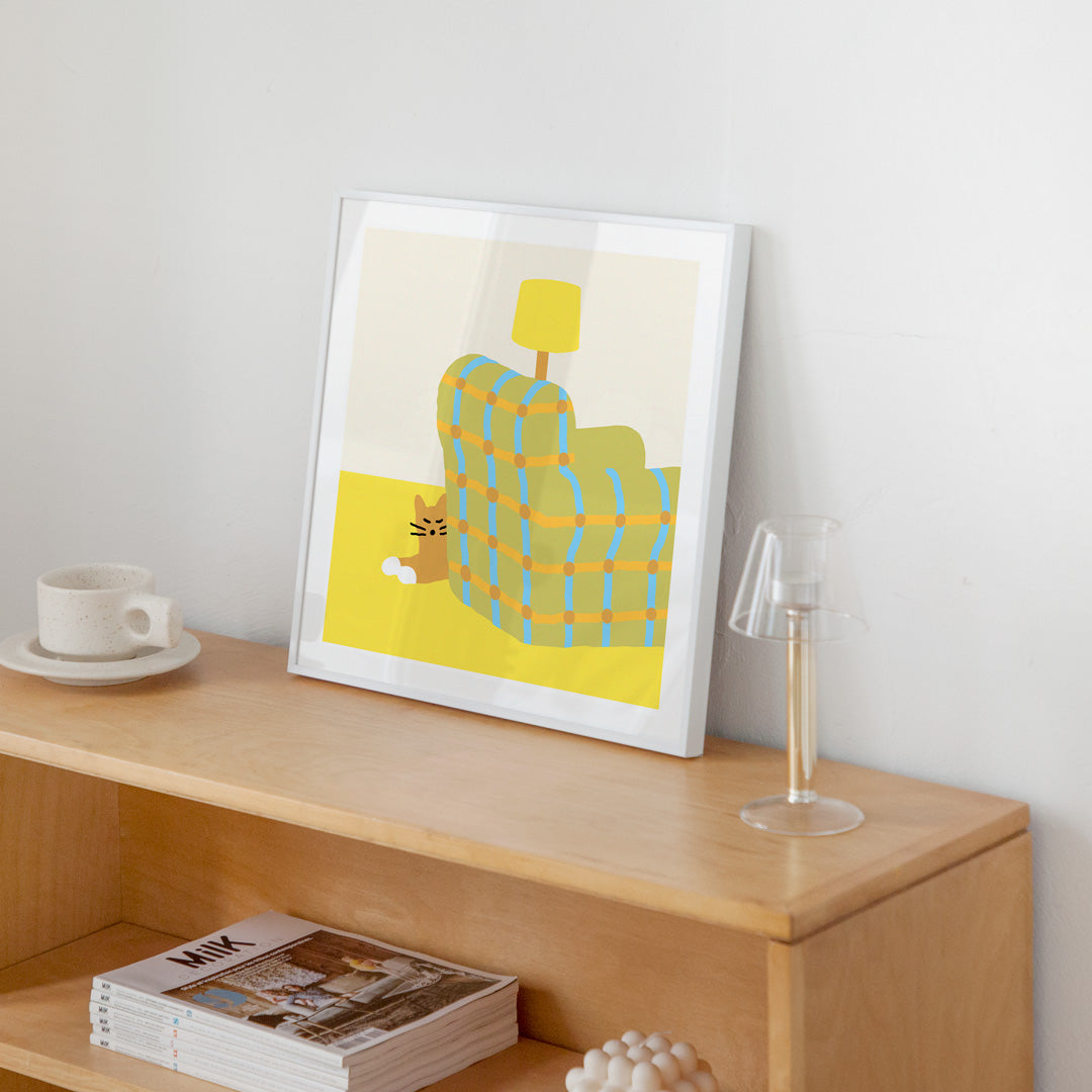 Armchair Sleeping Cat Poster in White Frame